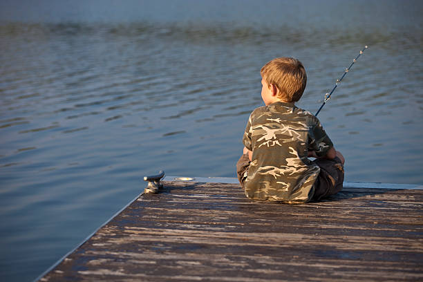Little Girl Fishing in a lake