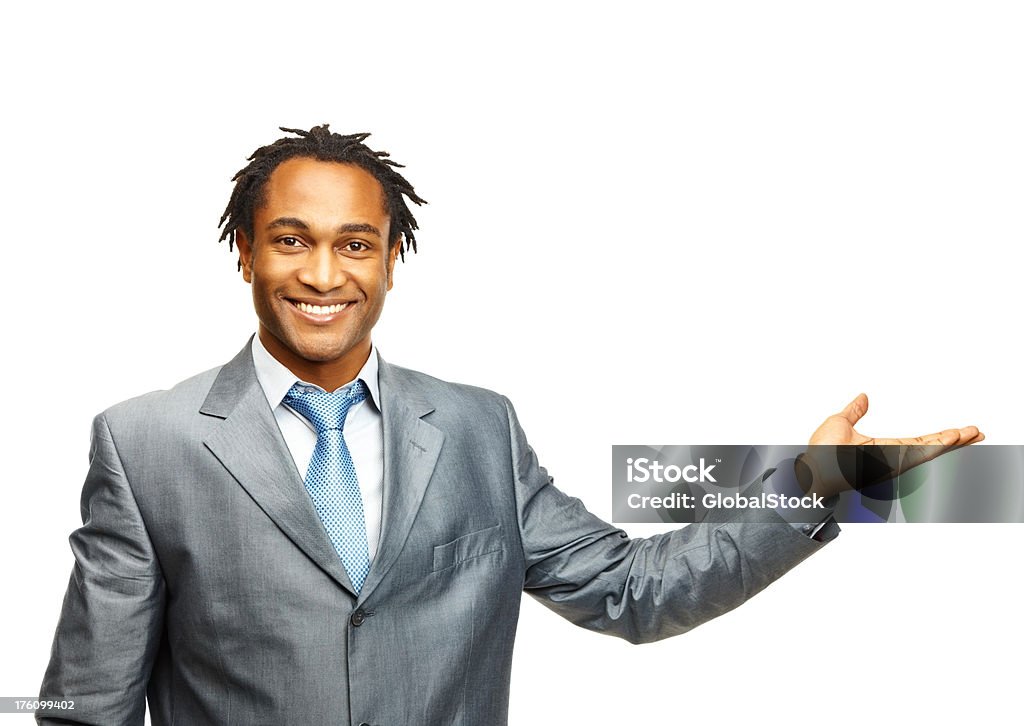 Jeune homme d'affaires gestes sur blanc - Photo de 20-24 ans libre de droits
