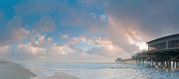 istock Cocoa Beach pier sunrise ocean panorama Florida USA 176100123