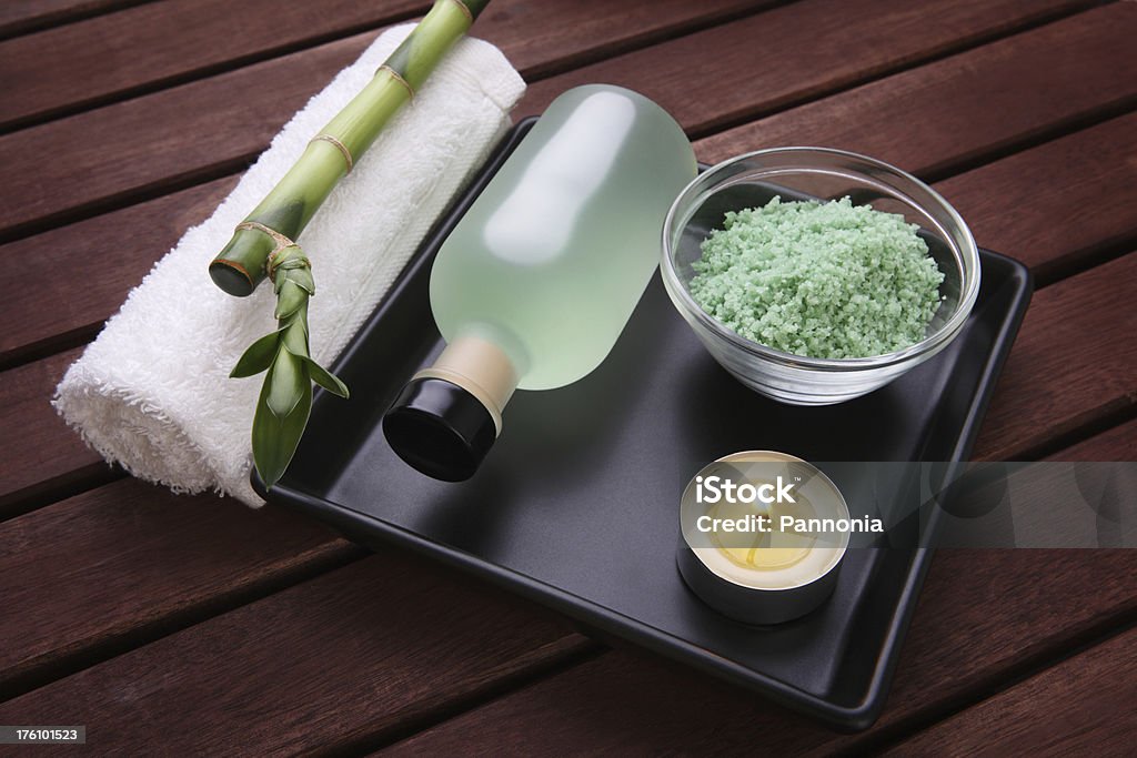 Spa accessories Spa accessories with towel, massage oil Aromatherapy Stock Photo