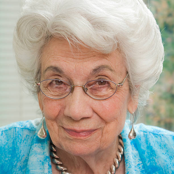 istock senior woman in blue blouse 176101680