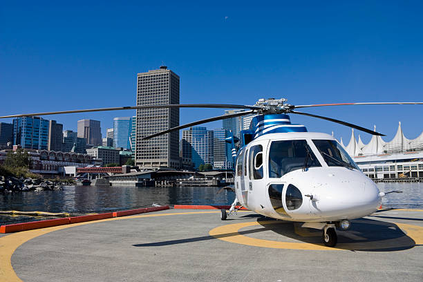 A corporate helicopter parked in downtown Vancouver
