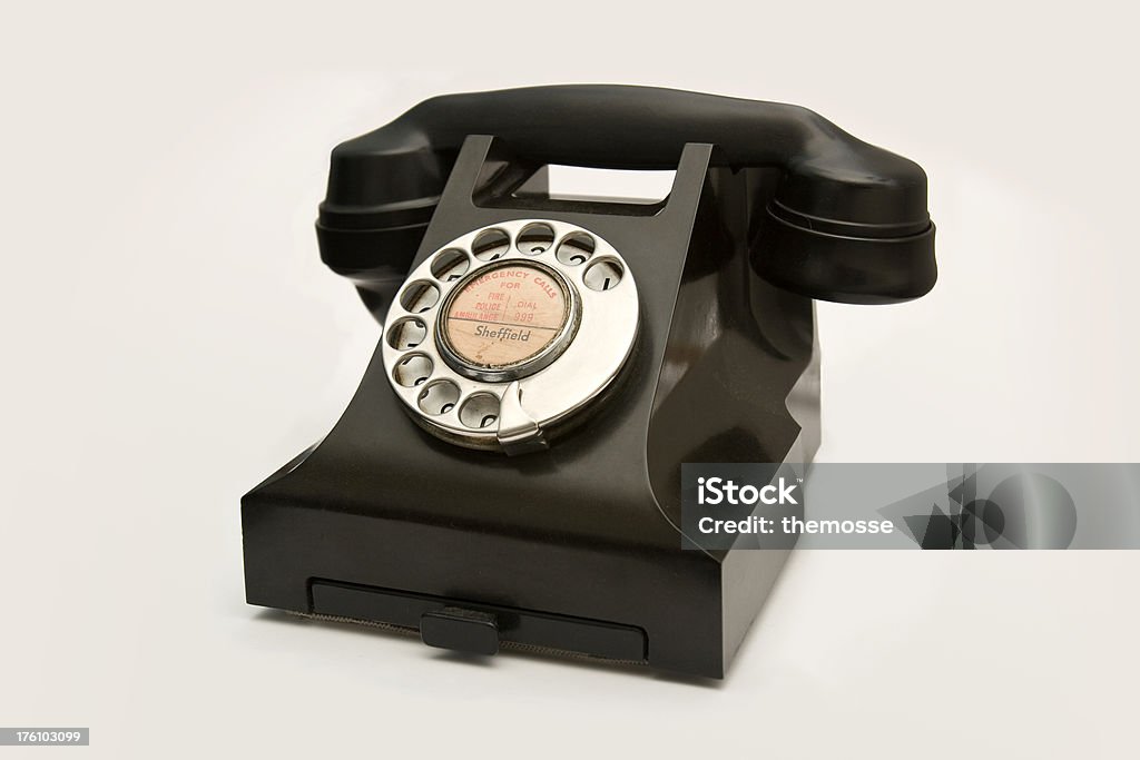 Retro Black Telephone This is a 1959 black bakelite phone with a silver dial and drawer.  Classic retro style and funky image...useful for all sorts.You may also be interested in: 1950-1959 Stock Photo
