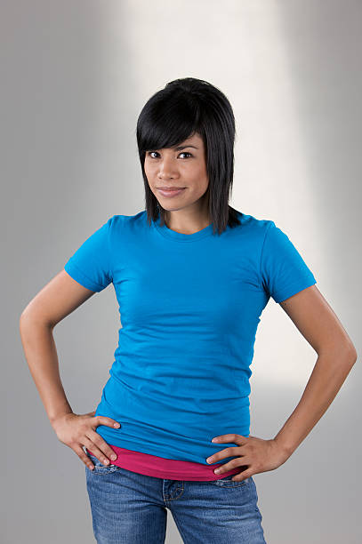 istock Young female model with blue shirt 176103720
