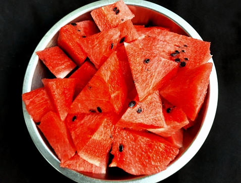 Cut and Peel Watermelon fruit.