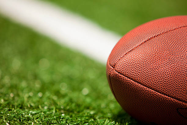 istock American football on the turf 176104499