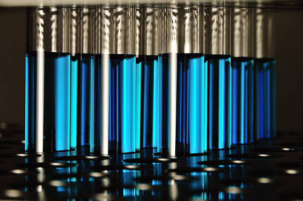 istock Blue Laboratory Test Tubes in Rack on Black Background 176104761