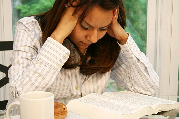 istock Young Hispanic Woman Reading A Book 176105169