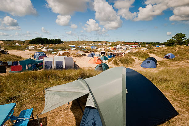 City of Tents The city of tents in a dune landscape with a lighthouse on the horizon amrum stock pictures, royalty-free photos & images