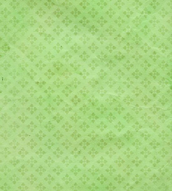 istock green textured paper with ornament 176105873