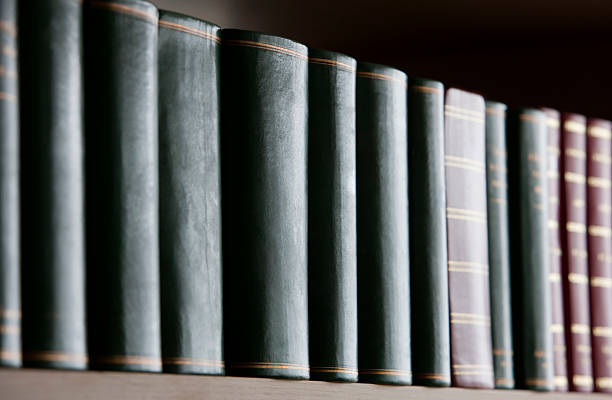 istock Antique books on a library shelf. 176105888