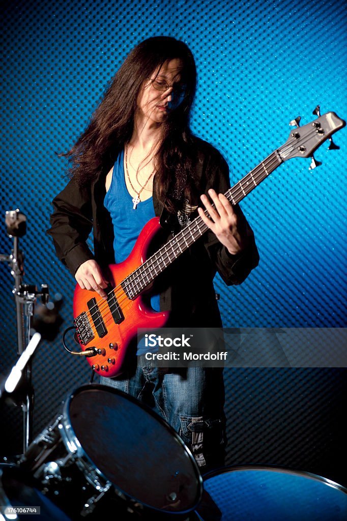 Long Hair Man Playing Bass Guitar Stock Photo - Download Image Now - Activity, Adult, Arts Culture and Entertainment - iStock Long Hair Man Playing Bass Guitar Stock Photo - Download Image Now - Activity, Adult, Arts Culture and Entertainment - iStock