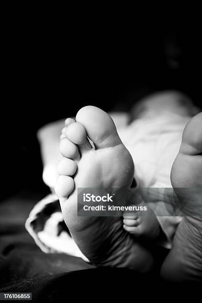 Baby Feet And Adult In Black White Image Stock Photo - Download Image Now - Adult, Baby - Human Age, Barefoot