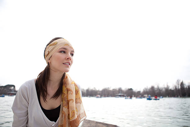 istock Young beautiful woman rowing a boat in Madrid 176106964