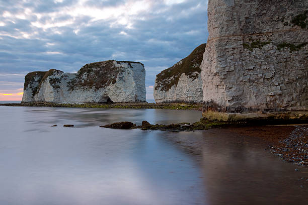 Low tide at Old Harry Rocks "An extremely low tide and a very risky walk enabled me to get this viewpoint of Old Harry Rocks, the starting point of the world heritage coastline, Dorset, U.K" studland heath stock pictures, royalty-free photos & images