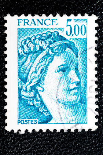 Stockholm, Sweden - February 11, 2013: An red stamp printed in the Netherlands. Stamp shows the Nederland king Bernhard and queen Juliana, circa 1962.