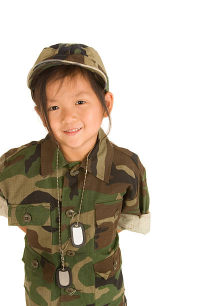 Asian little girl wearing military uniform
