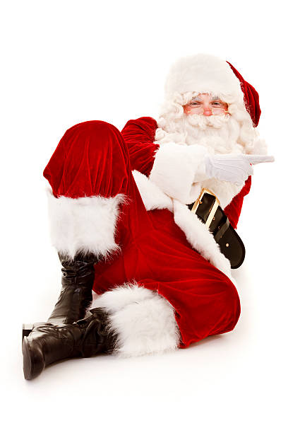 Santa pointing isolated on white stock photo