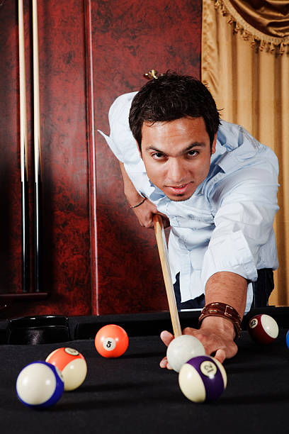 istock Young male adult at the pool table 176108593