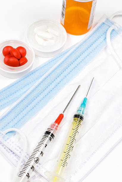 gripe h1n1) (prevención y lucha contra los medicamentos-i - syringe medical injection surgical needle surgical mask fotografías e imágenes de stock