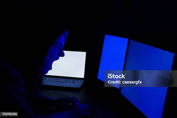 Technology Computer Hack Blue Screen Angry Hacker In Front Of Blue Screen Stock Photo - Download Image Now ...