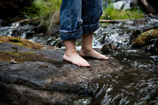 istock Little feet by the creek 176111299