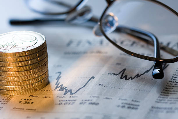istock Glasses and Euro Coins 176111563