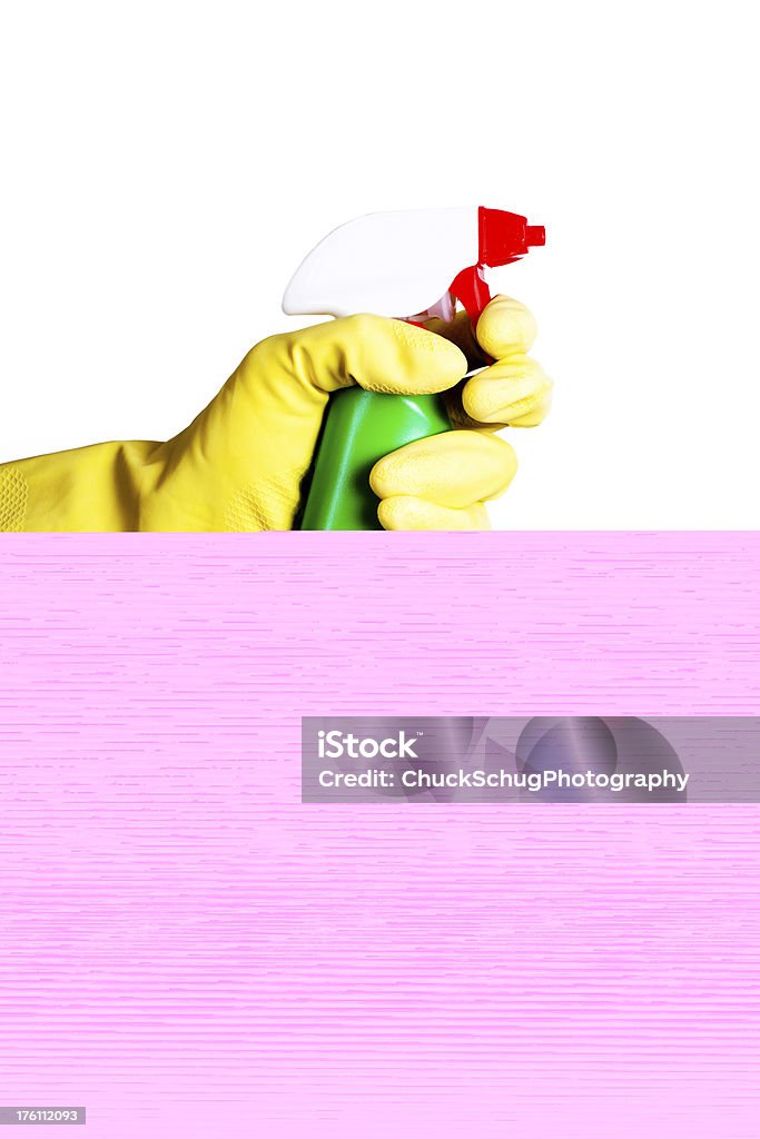Mano che tiene un detergente con guanti su sfondo bianco - Foto stock royalty-free di Castore - Castore e Polluce