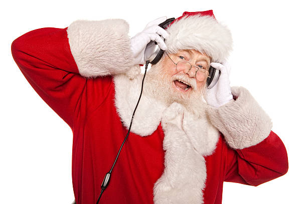 fotos de real entalar papai noel com fones de ouvido - santa claus audio - fotografias e filmes do acervo