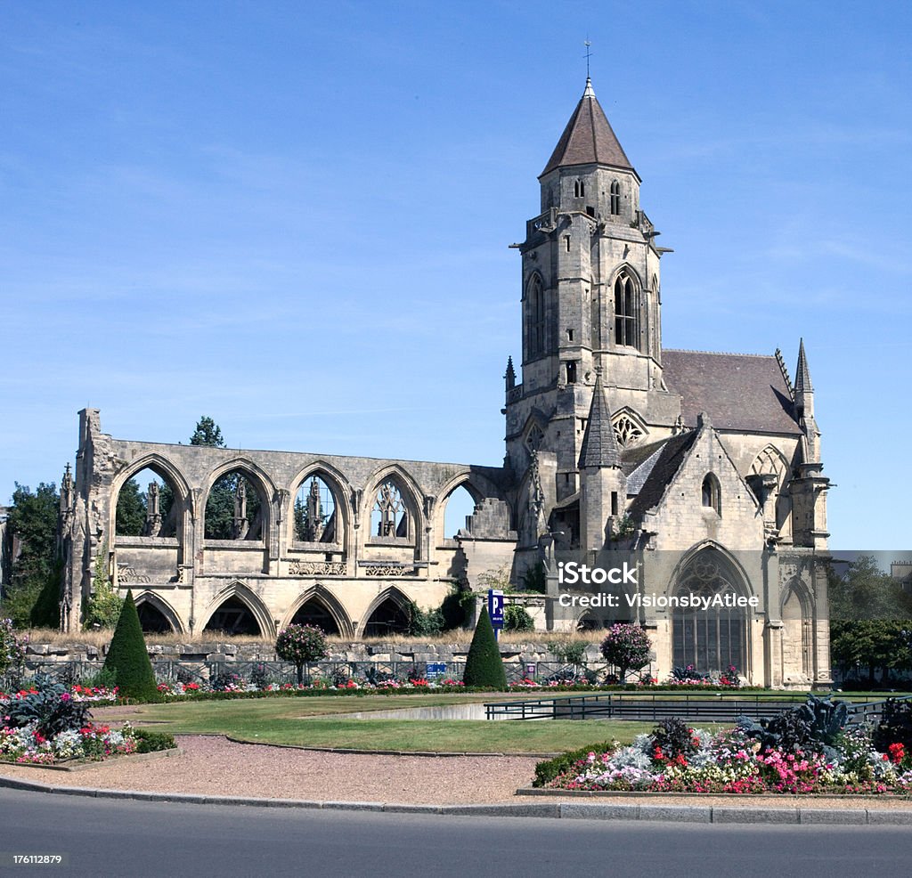 Old St. Stephen's Church – Caen, Normandy France "Located next to the Abbaye aux Hommes in Caen are the ruins of St-Etienne-le-Vieux, a large medieval church. It is also known as Old St. Stephen's church because it is adjacent to the newer Abbaye aux Hommes that was also dedicated to St. Stephen. Originally built in the Romanesque style in the 11th century, it was destroyed during the 100 years war but rebuilt in the Gothic style. During the French Revolution it was used as a stable. St-Etienne-le-Vieux was saved from demolition by Arcisse de Caumont in 1847, but was partly destroyed in World War II in another bombing of 1944." Abbey - Monastery Stock Photo