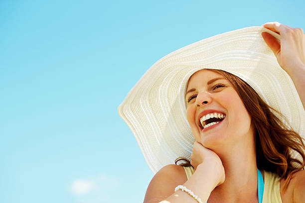 istock Excited young woman wearing a sun hat 176112954