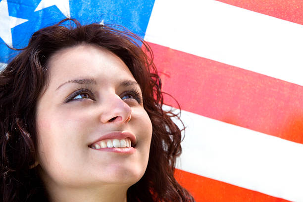 beautiful girl with american flag on background