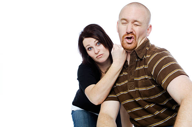 istock Abusive Woman Punching Man in His Face 176113417