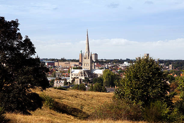 A view over the city of Norwich, in Norfolk, England, from Mousehold Heath. Many of the ancient churches and medieval buildings which make the city famous can be seen.