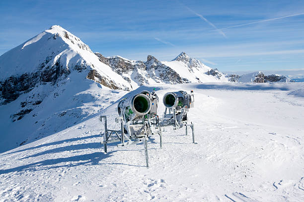 Waiting snow cannons in wintertime