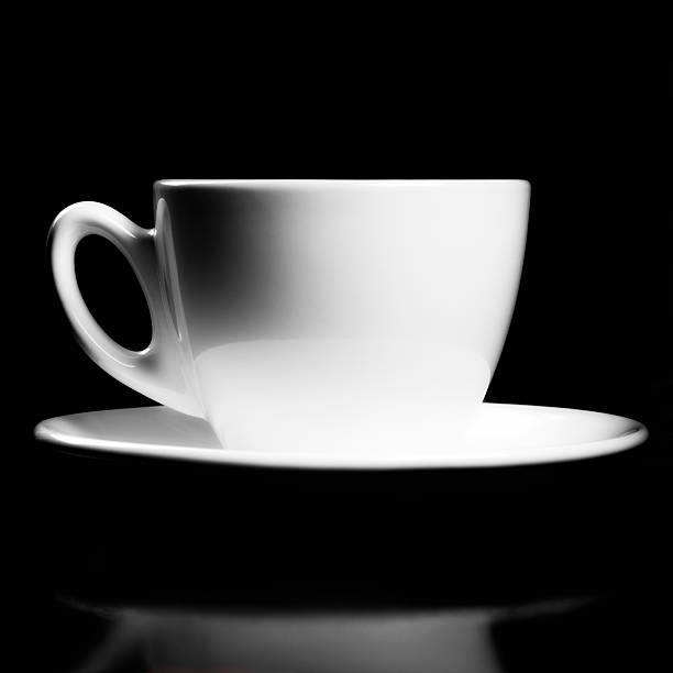 istock Porcelain cup isolated on black 176114720