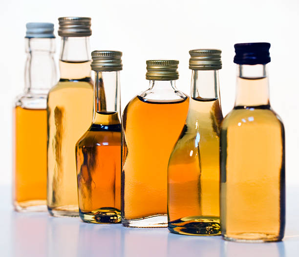 Image of assorted alcohol bottles stock photo
