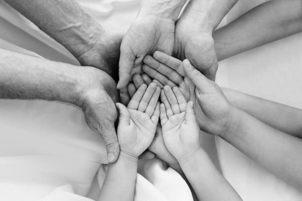 istock Hands. Human hand together closeup 1761150608