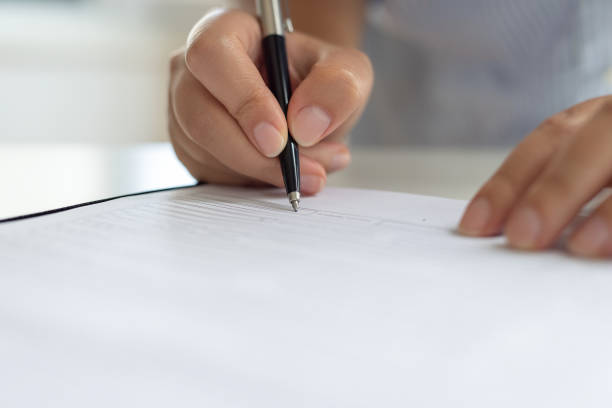 istock Businesswoman signing contract 1761157514