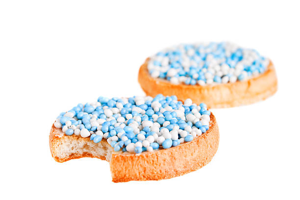 istock Dutch food: 'beschuit met muisjes', isolated on white 176116071