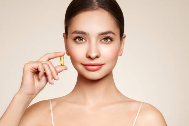 Beautiful Girl With Pill With Cod Liver Oil Omega-3