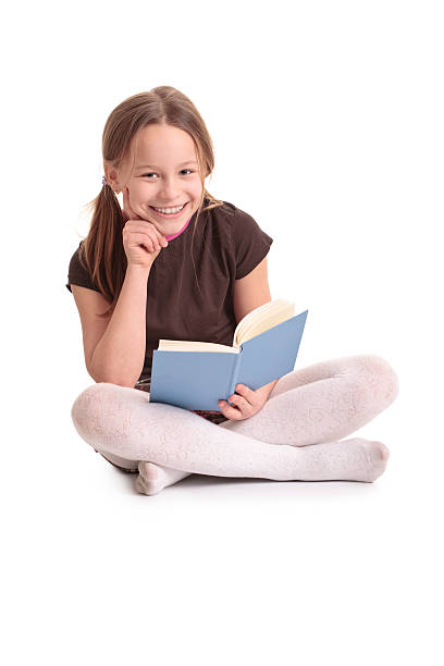 istock ten years old girl reading a book 176116657