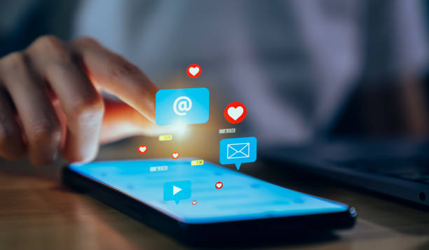 istock Hand using smartphone with social media and email on mobile. 1761168581