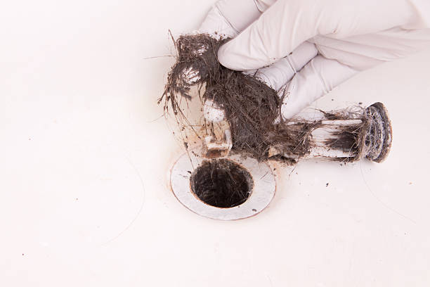 istock Nasty Dirty Hair Clog Pulled out with Sink Stopper 176117200