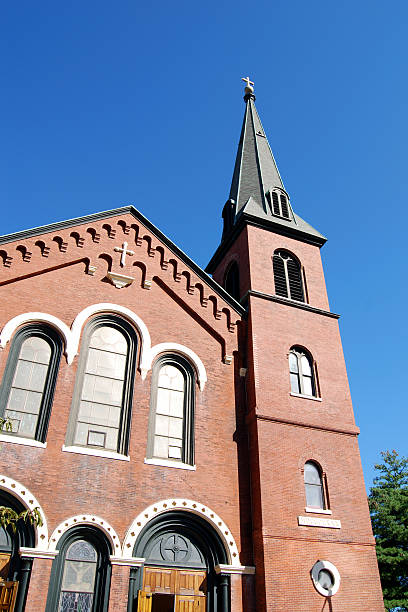 istock Old Brick Church Against Blue Sky 176117894