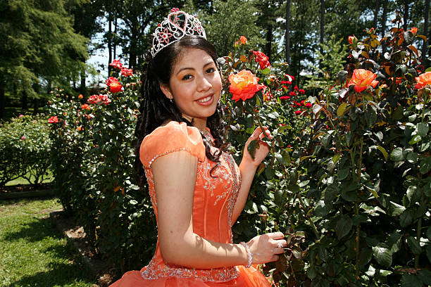 Beautiful Quinceanera Young teen wearing a party dress on her 15th birthday. quinceanera stock pictures, royalty-free photos & images