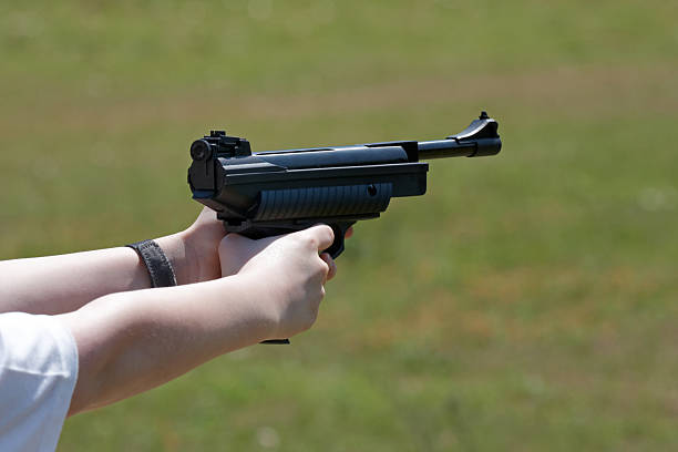 istock shooting with an airgun 176118485