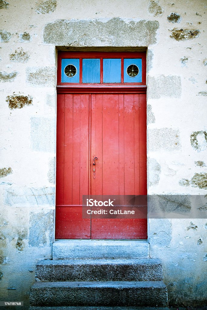 Rustic Door Rustic red door in France Air Duct Stock Photo