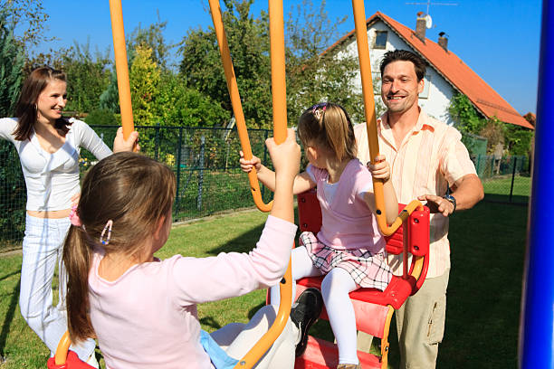 istock family playing in the garden 176119668