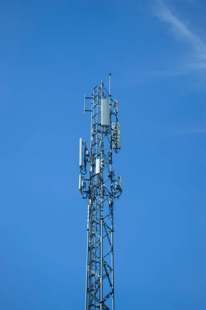 istock communication tower or 4G 5G network telephone cell site  on blue sky and space for text. 1761197250
